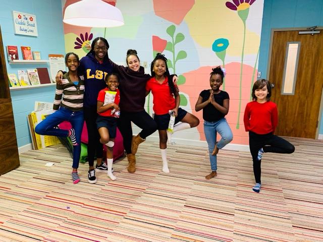 A photo of 2019 ASF Fellow Jessica McKenzie with some of her student participants at a Girls on the Run Birmingham session.