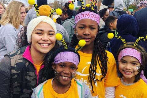 A photo of Jessica McKenzie and some of her participants at the Girls on the Run 5K after the Fall 2019 season.