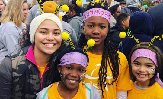 A photo of Jessica McKenzie and some of her participants at the Girls on the Run 5K after the Fall 2019 season.